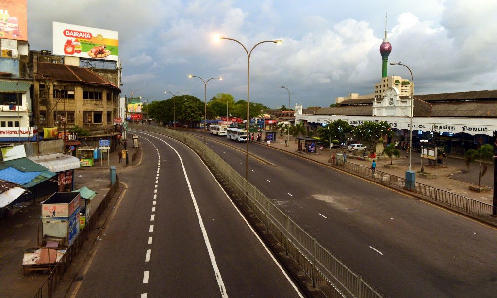The streets emptied as a curfew took effect in Colombo on Sunday evening.