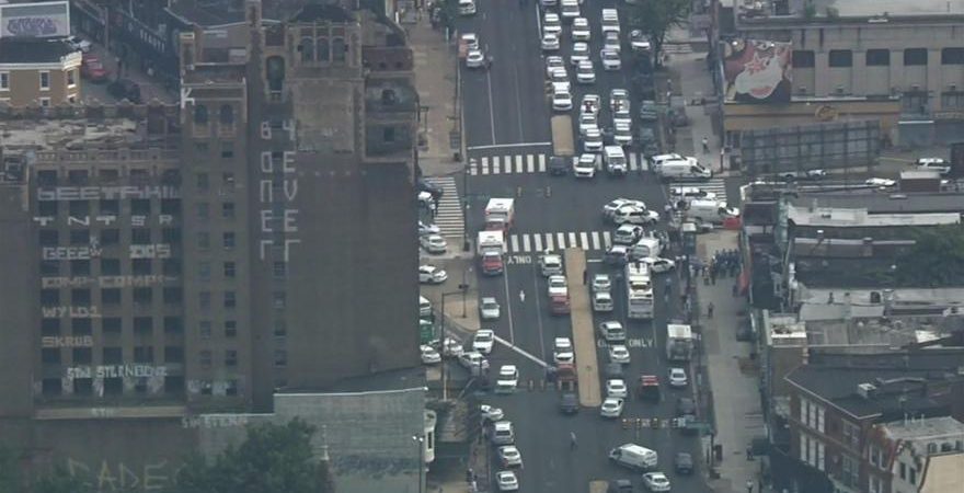Police in standoff with barricaded shooter who wounded 6 Philadelphia officers; 2 officers trapped