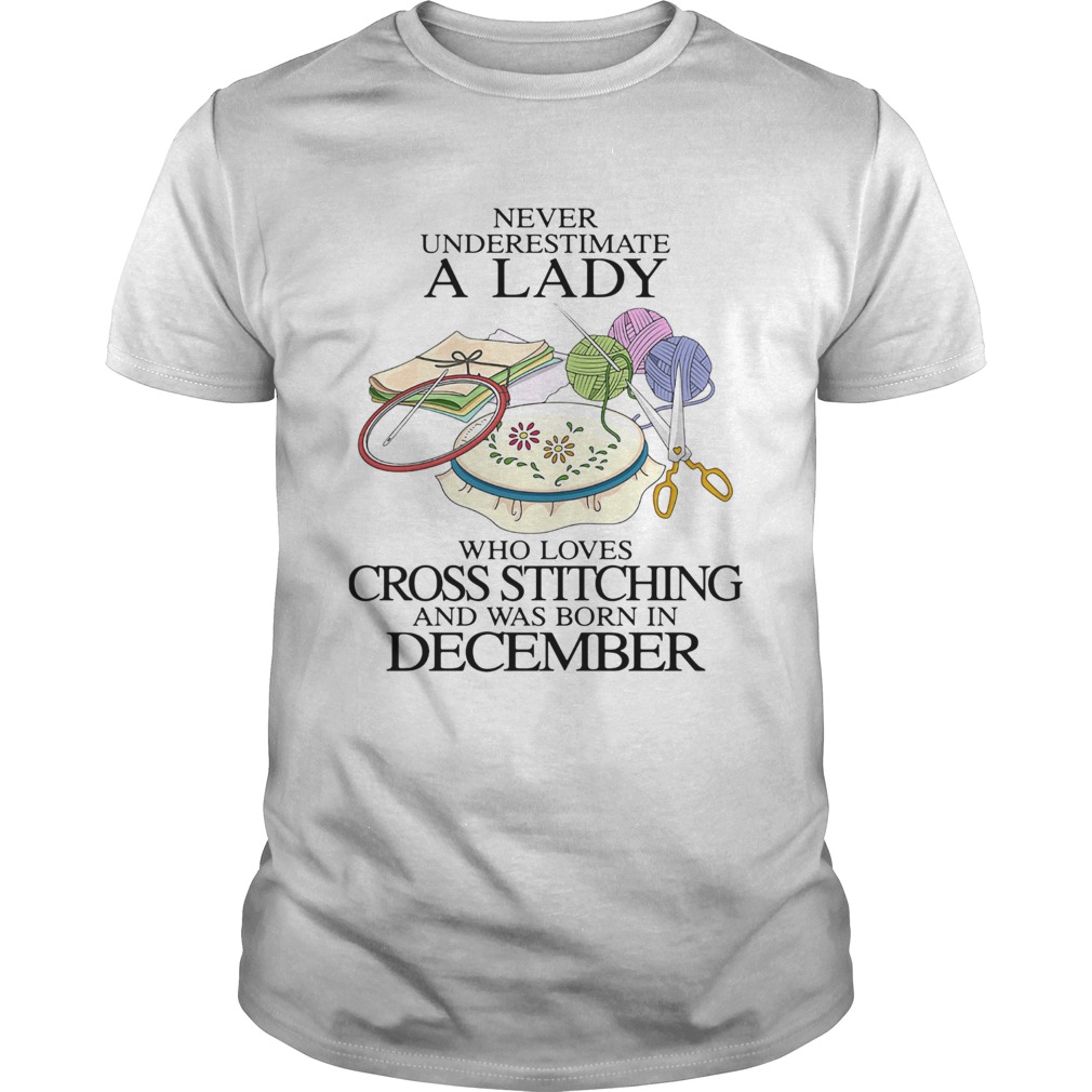 Never underestimate a lady who loves cross stitching and was born in december Unisex