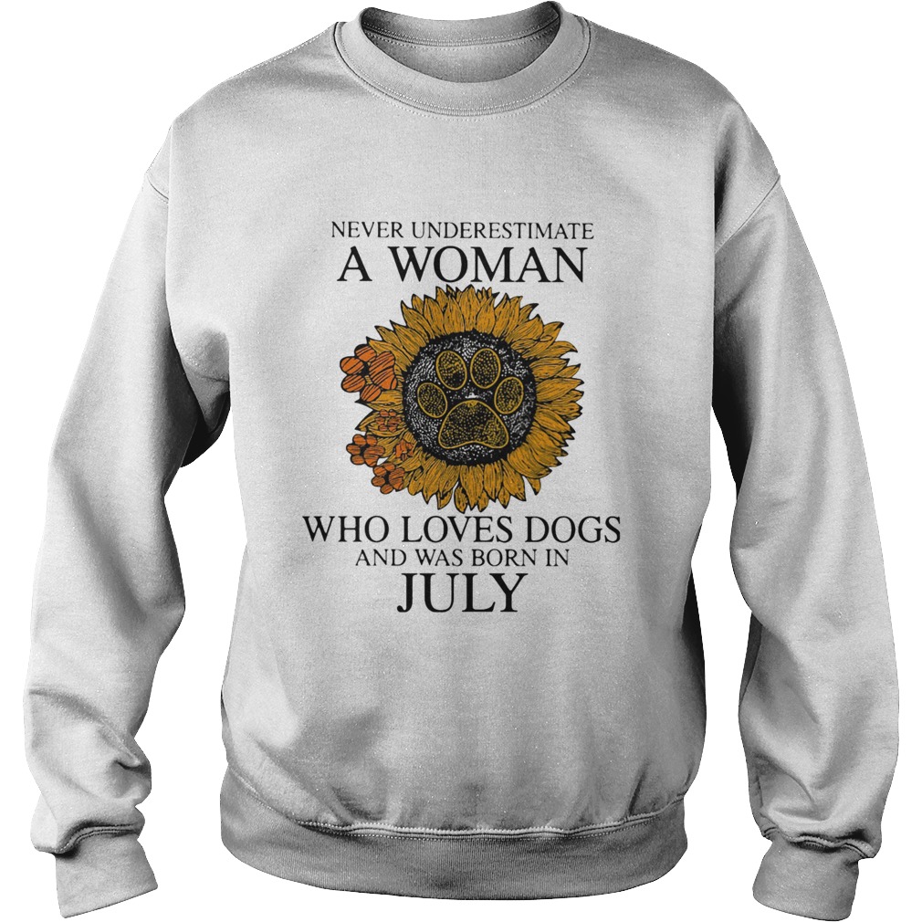 Never underestimate a woman who loves paw dogs and was born in july sunflower Sweatshirt