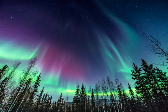 Northern lights, known for glowing red and green colors, could be visible this week across northern US